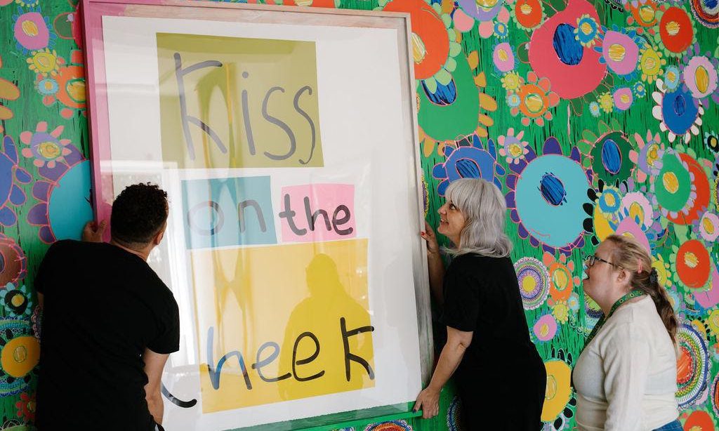 An artist supervises the installation of her work at Glasgow International Festival 2021